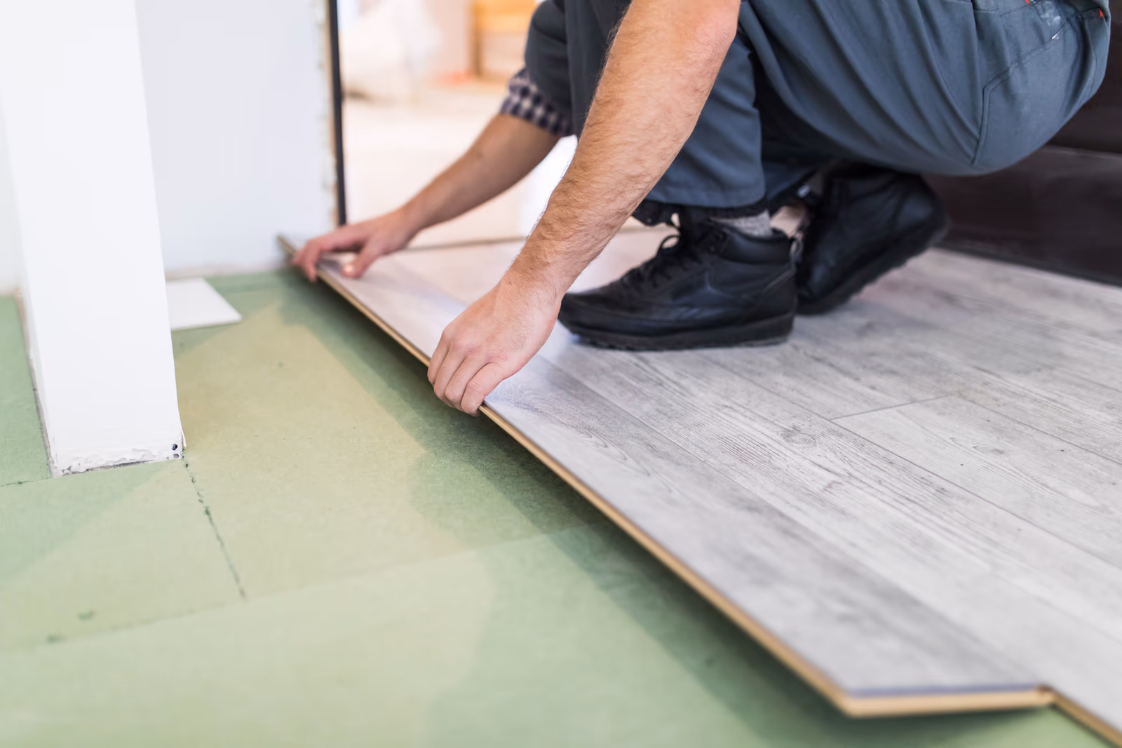 Professional joiner answering homeowner questions